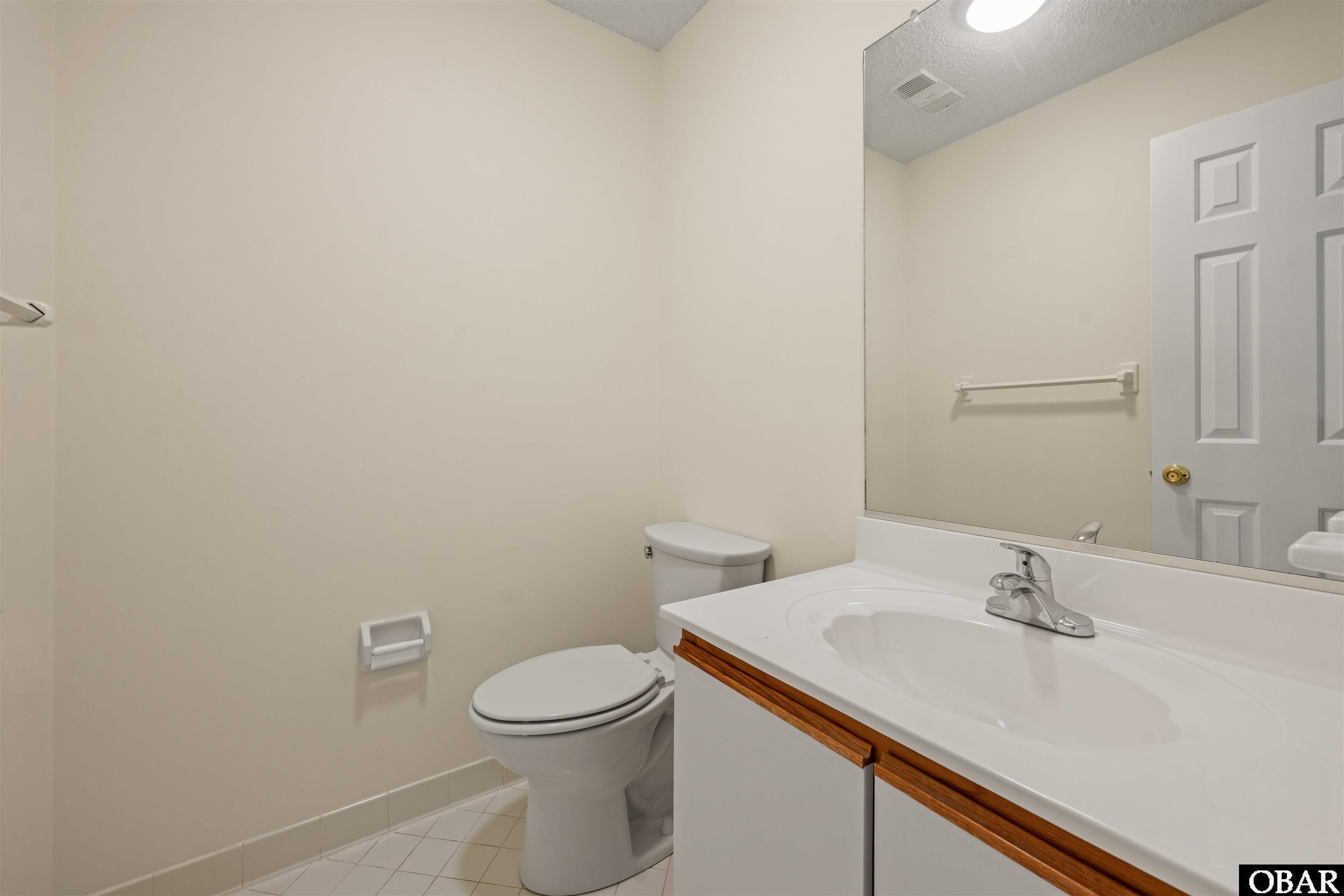 4103 Captain Cuttle Court, Unit 4103 Kitty Hawk, NC 27949 - Photo 9 of 25 Half bath