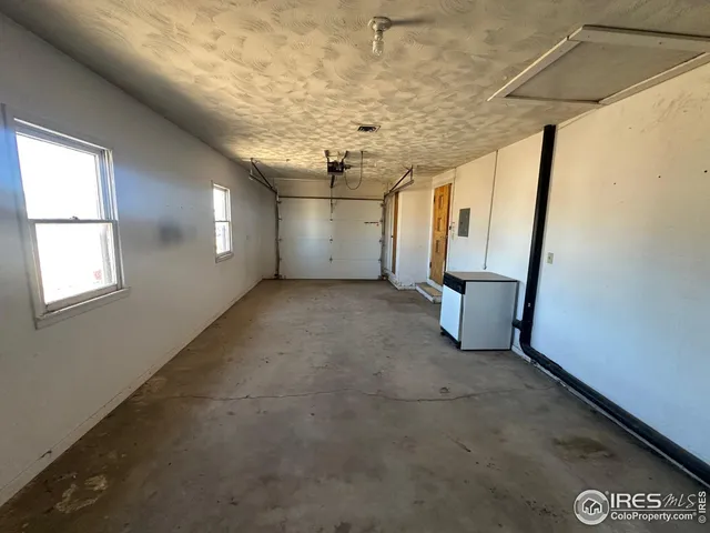 a view of a room with a garage