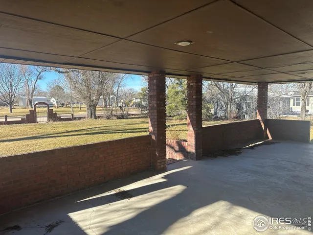 a view of an empty room and a balcony