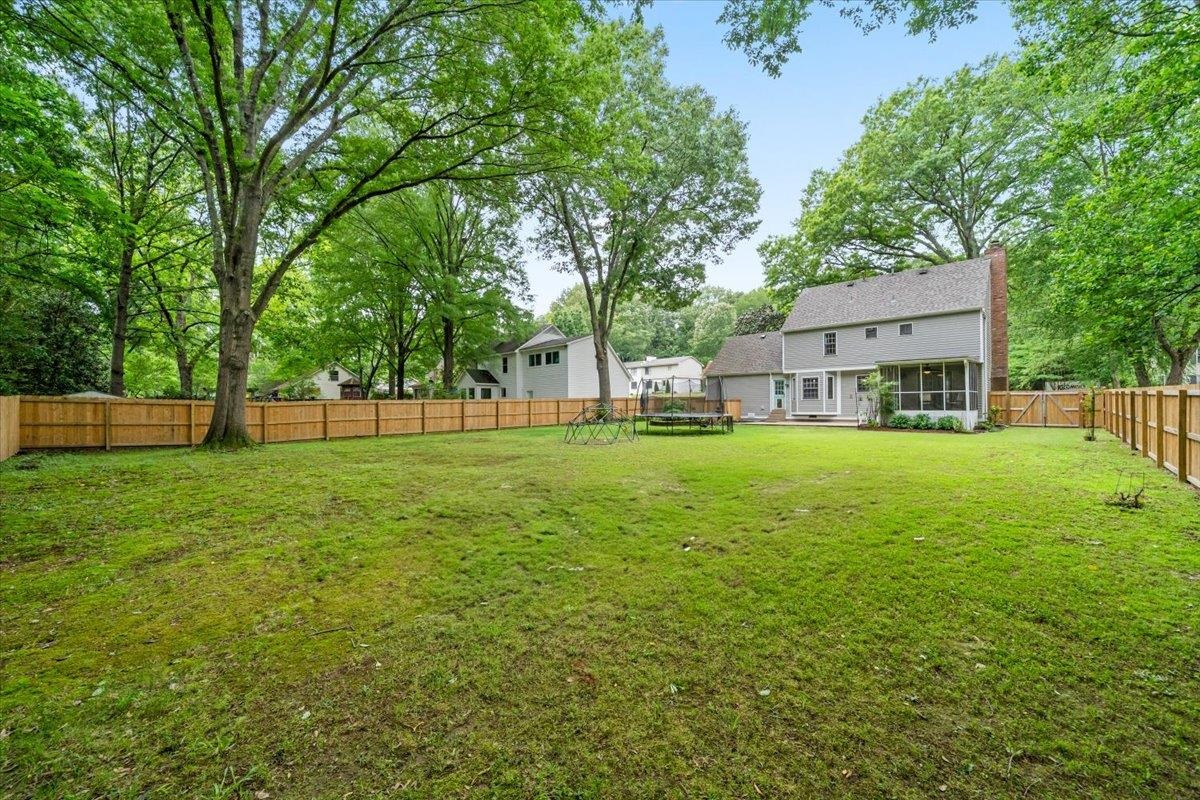 396 Dove Valley Road Collierville, TN 38017 - Photo 29 of 30 a view of a house with a big yard