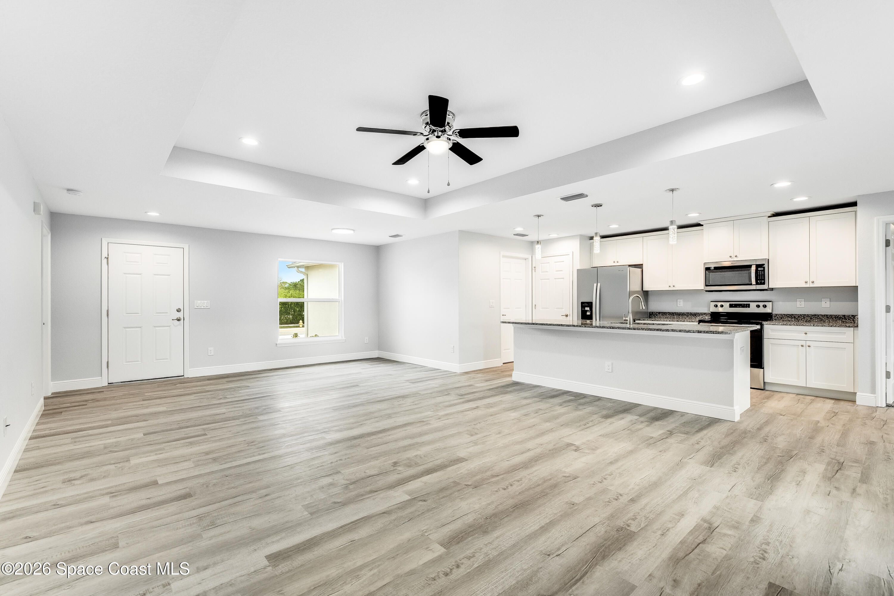 533 Fellenz Street Palm Bay, FL 32908 - Photo 10 of 42 10. Entry:Living:Kitchen