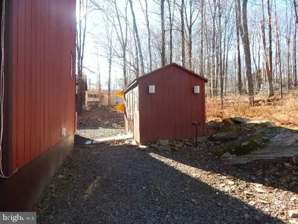 a view of backyard with green space