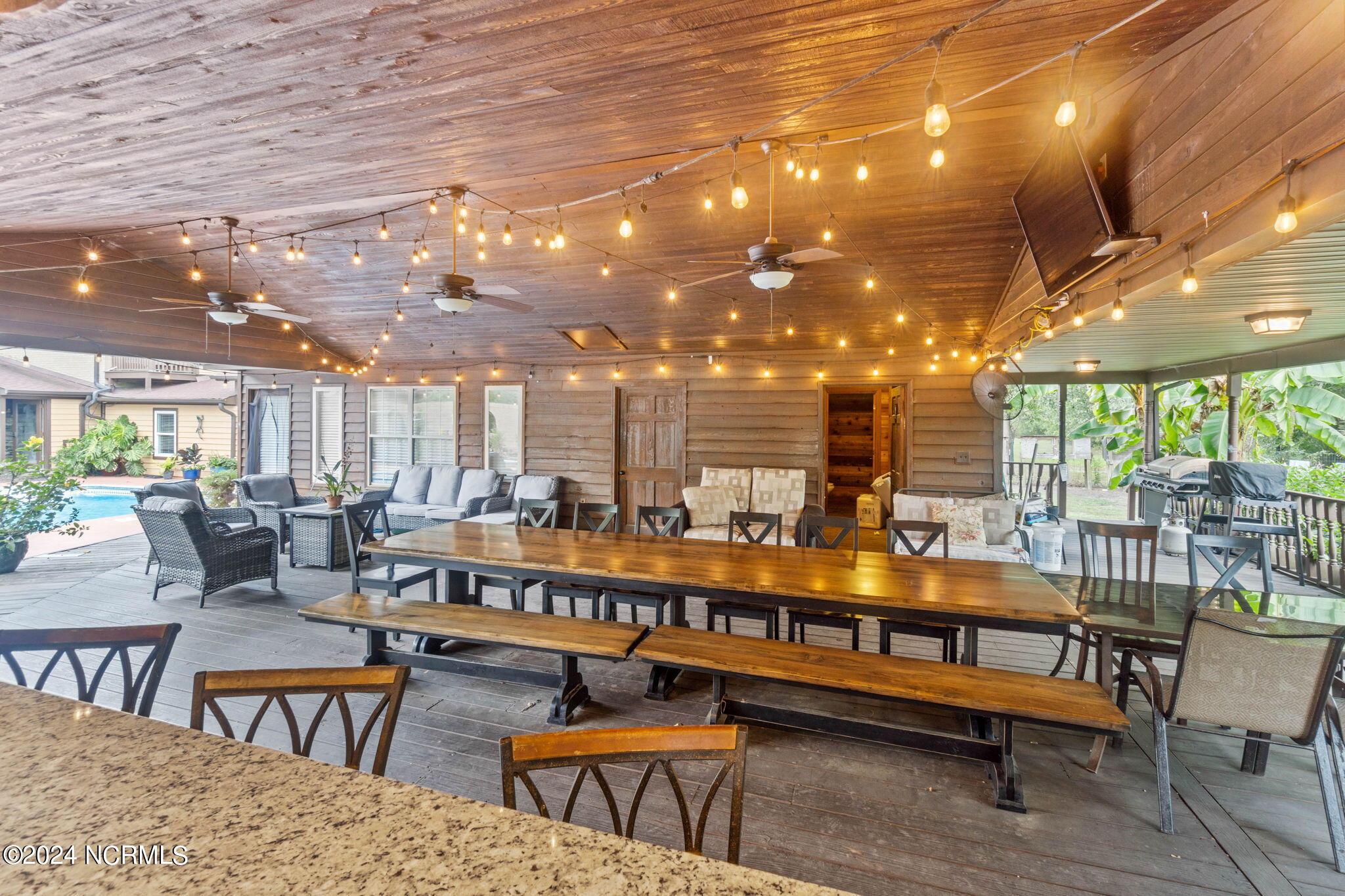 1491 Lanvale Road Leland, NC 28451 - Photo 62 of 95 Outdoor Covered Deck by Pool