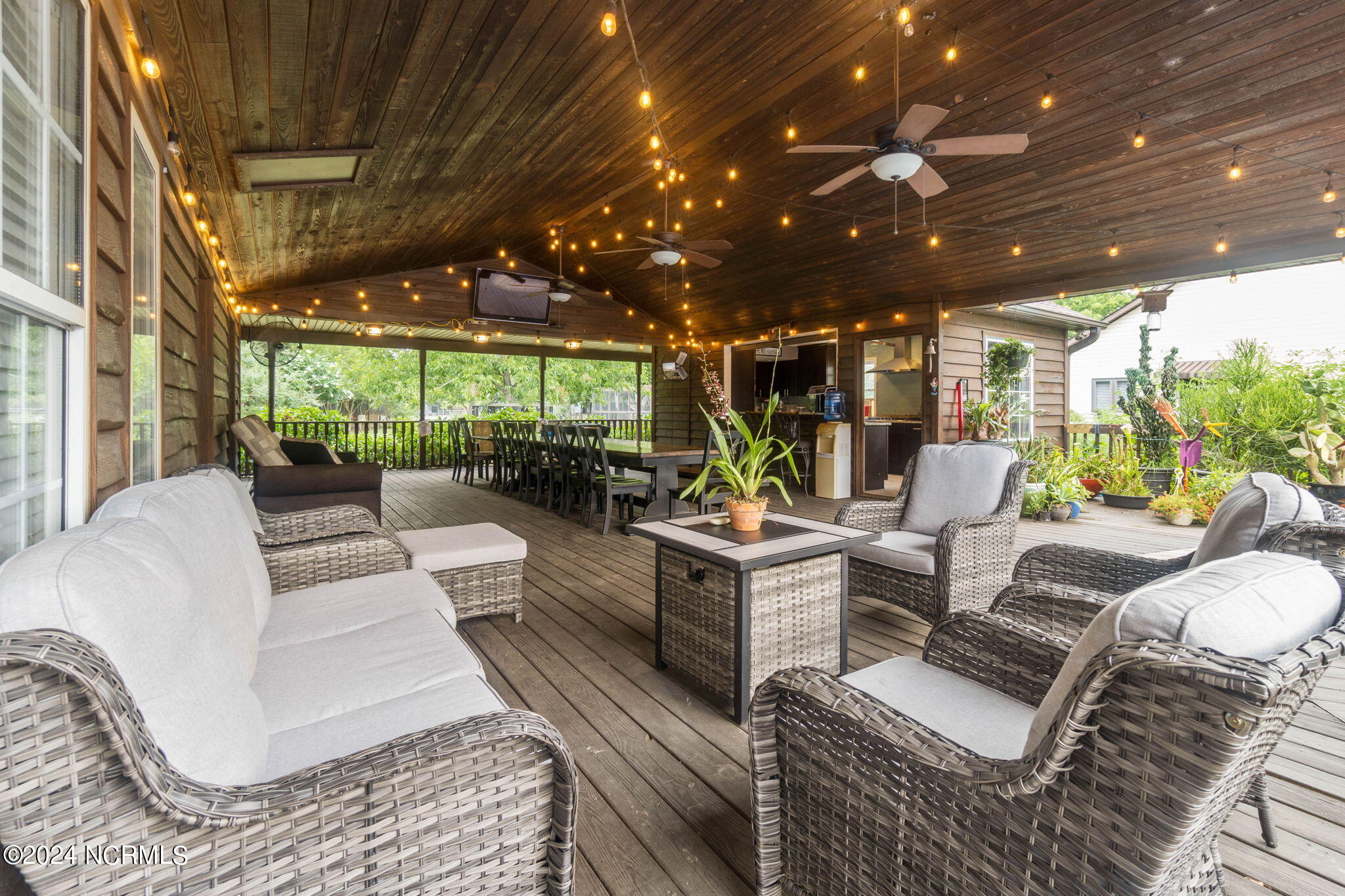 1491 Lanvale Road Leland, NC 28451 - Photo 63 of 95 Outdoor Covered Deck by kitchen and Pool