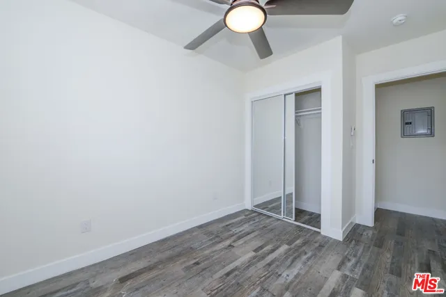 a view of a livingroom with wooden floor