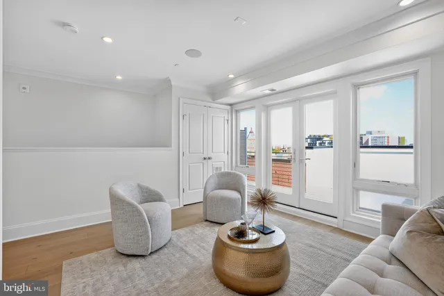 a living room with furniture and decor