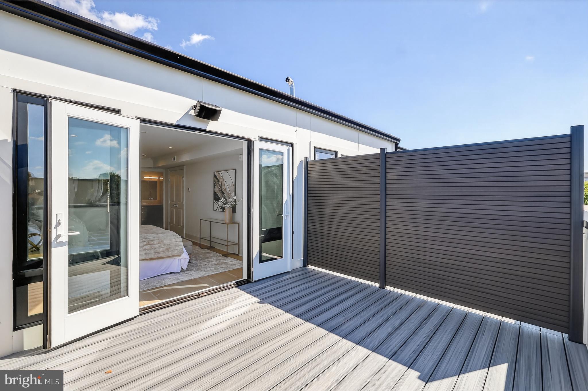 1335 11th Street Northwest, Unit PH2 Washington, DC 20001 - Photo 25 of 25 a view of a balcony with wooden floor