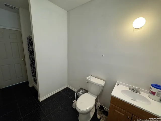 a view of backyard with green space