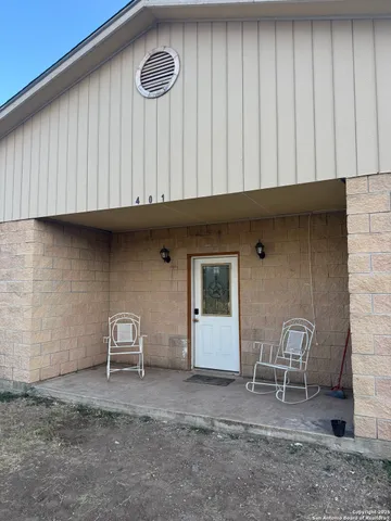 a view of a room with table and chair