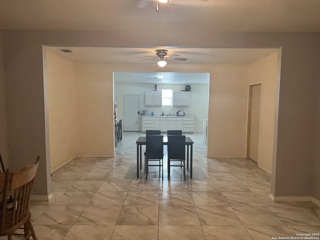 a view of a livingroom with furniture nad wooden floor