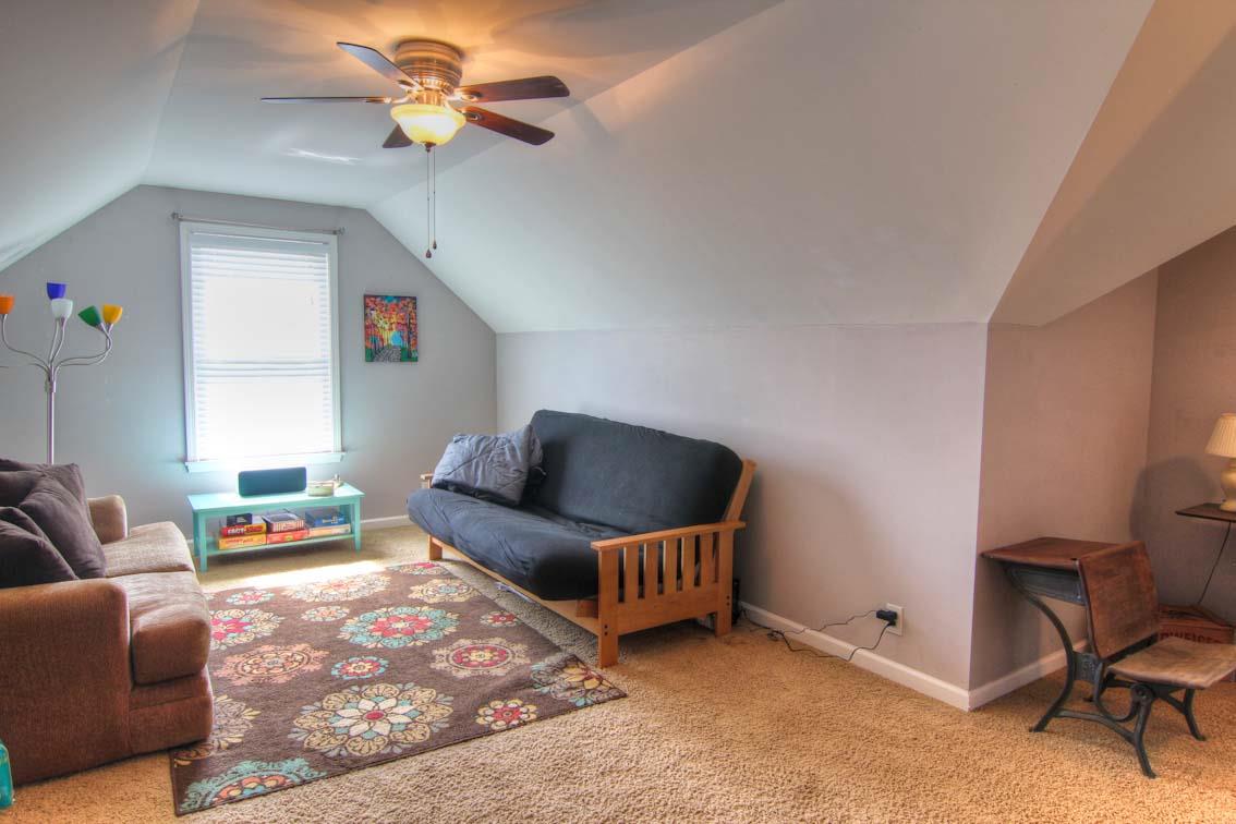 3928 Rowland Road Murfreesboro, TN 37128 - Photo 17 of 25 a bedroom with furniture and a chandelier