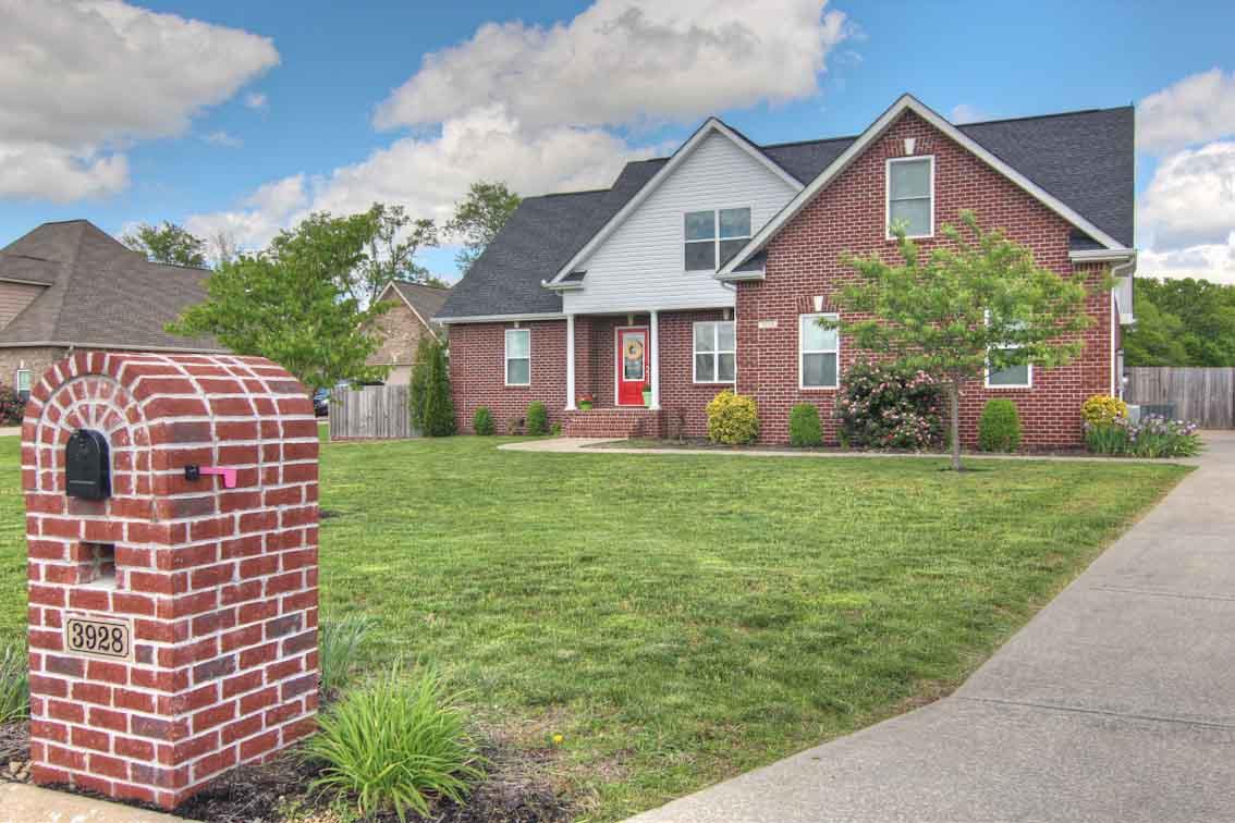 3928 Rowland Road Murfreesboro, TN 37128 - Photo 2 of 25 a front view of a house with garden