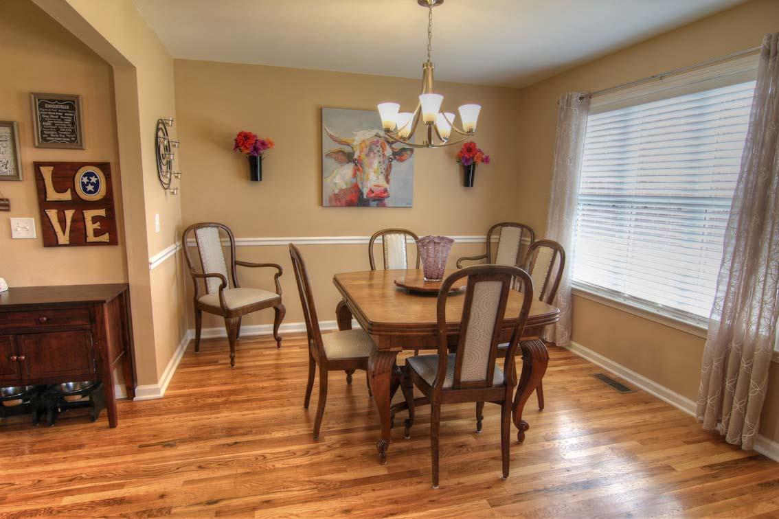 3928 Rowland Road Murfreesboro, TN 37128 - Photo 6 of 25 a view of a dining room with furniture wooden floor and chandelier