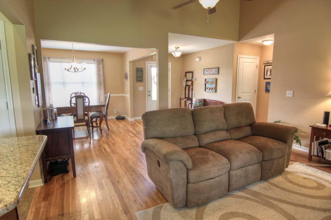 3928 Rowland Road Murfreesboro, TN 37128 - Photo 7 of 25 a living room with furniture and a table