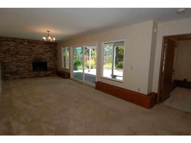 25 Point Reyes Way Pacifica, CA 94044 - Photo 11 of 22 a view of a livingroom with a fireplace