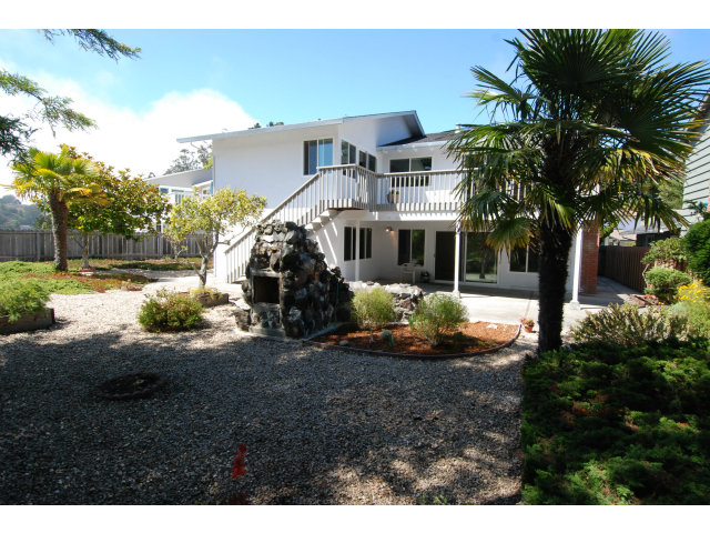 25 Point Reyes Way Pacifica, CA 94044 - Photo 12 of 22 a front view of a house with a yard