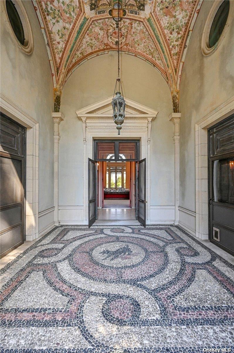 - Wheatley Road Old Westbury, NY 11568 - Photo 5 of 36 Fresco covered entrance with mosaic floor