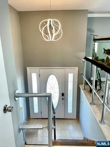 a view of entryway with a front door