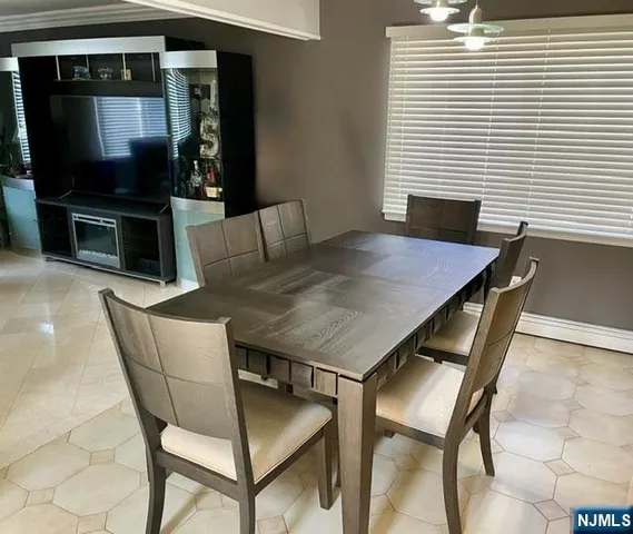 a view of a dining room with furniture