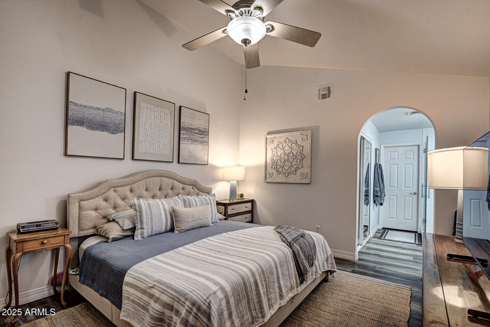 1501 North Beeline Highway, Unit 19 Payson, AZ 85541 - Photo 11 of 31 a bedroom with two beds and a chandelier