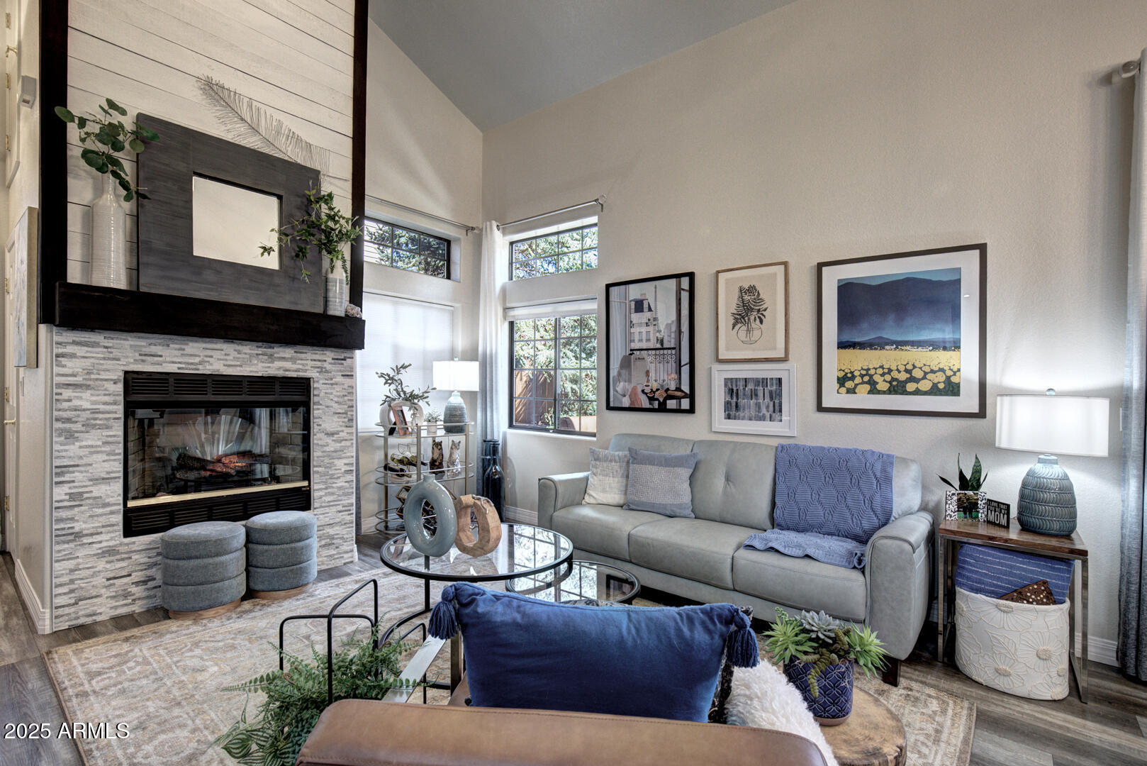 1501 North Beeline Highway, Unit 19 Payson, AZ 85541 - Photo 2 of 31 a living room with furniture and a fireplace