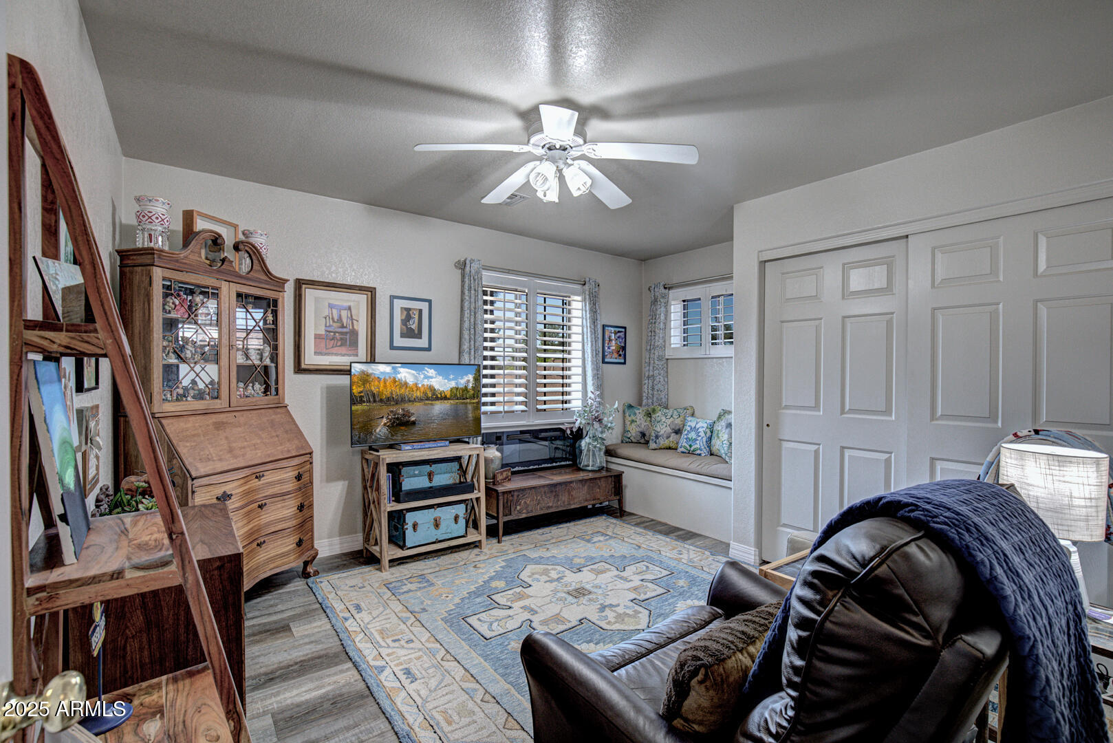 1501 North Beeline Highway, Unit 19 Payson, AZ 85541 - Photo 21 of 31 a bedroom with furniture and a window