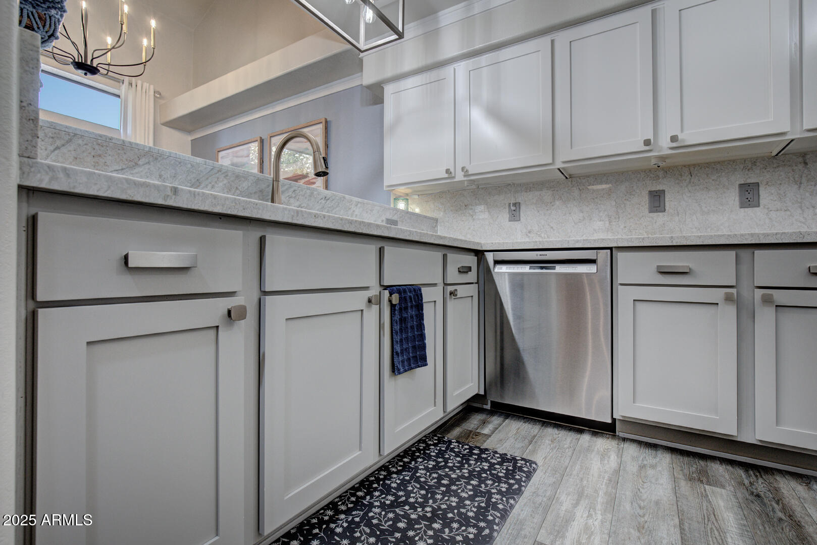 1501 North Beeline Highway, Unit 19 Payson, AZ 85541 - Photo 8 of 31 a kitchen with white cabinets and a sink