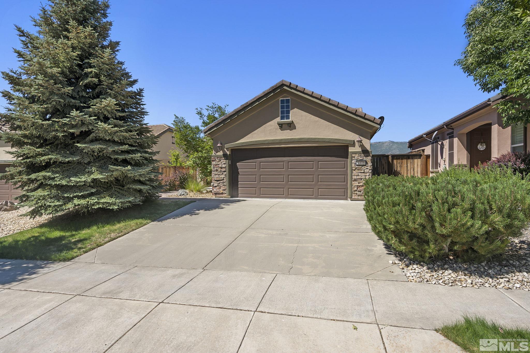1375 Tarleton Way Reno, NV 89523 - Photo 1 of 22 a front view of a house with garden