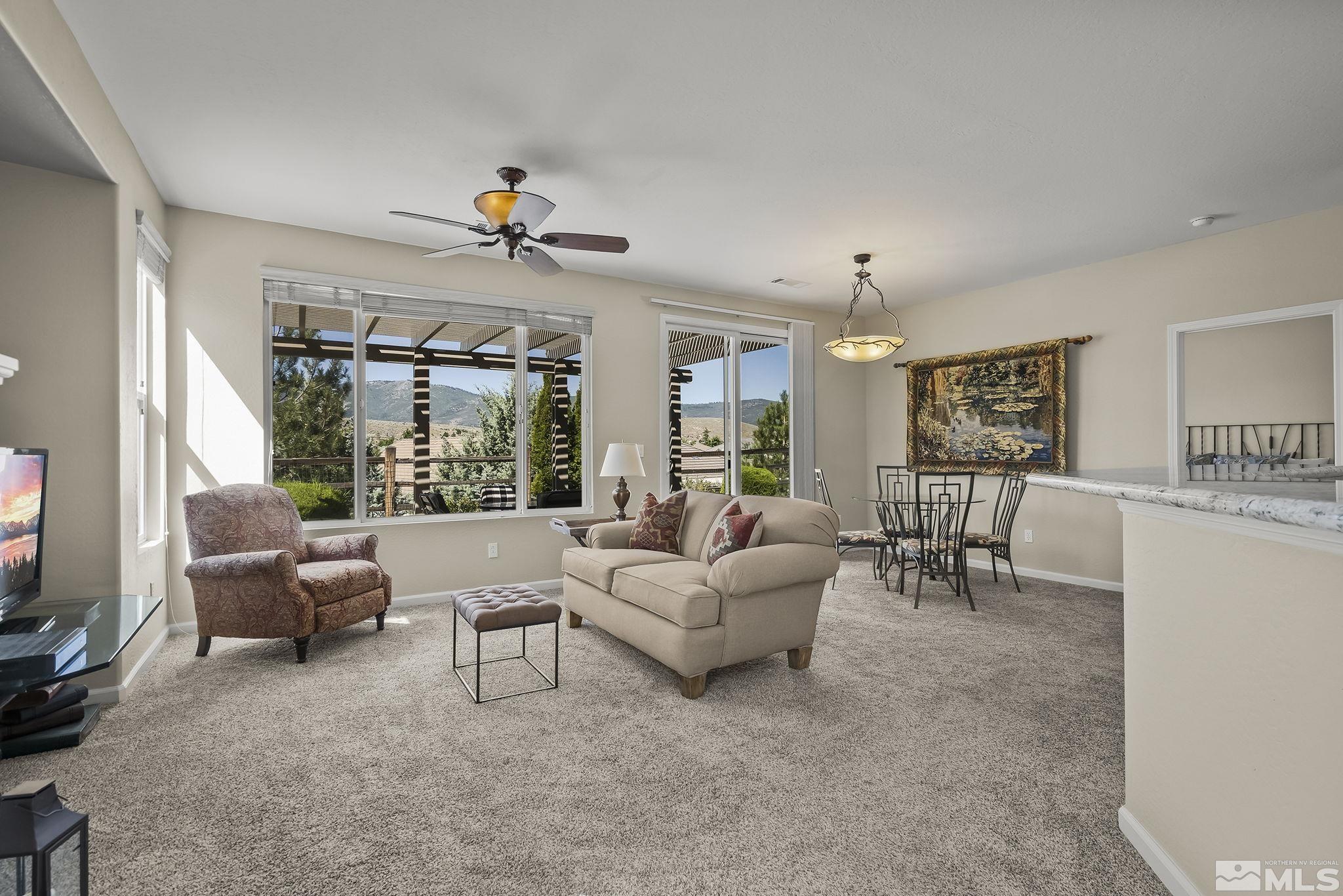 1375 Tarleton Way Reno, NV 89523 - Photo 6 of 22 a living room with furniture and a flat screen tv