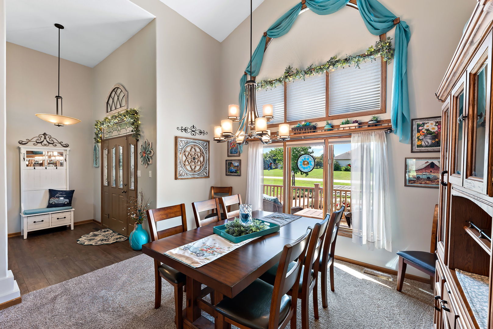 2364 Sunset View Lane Kankakee, IL 60901 - Photo 11 of 35 a dining room with furniture a chandelier and window