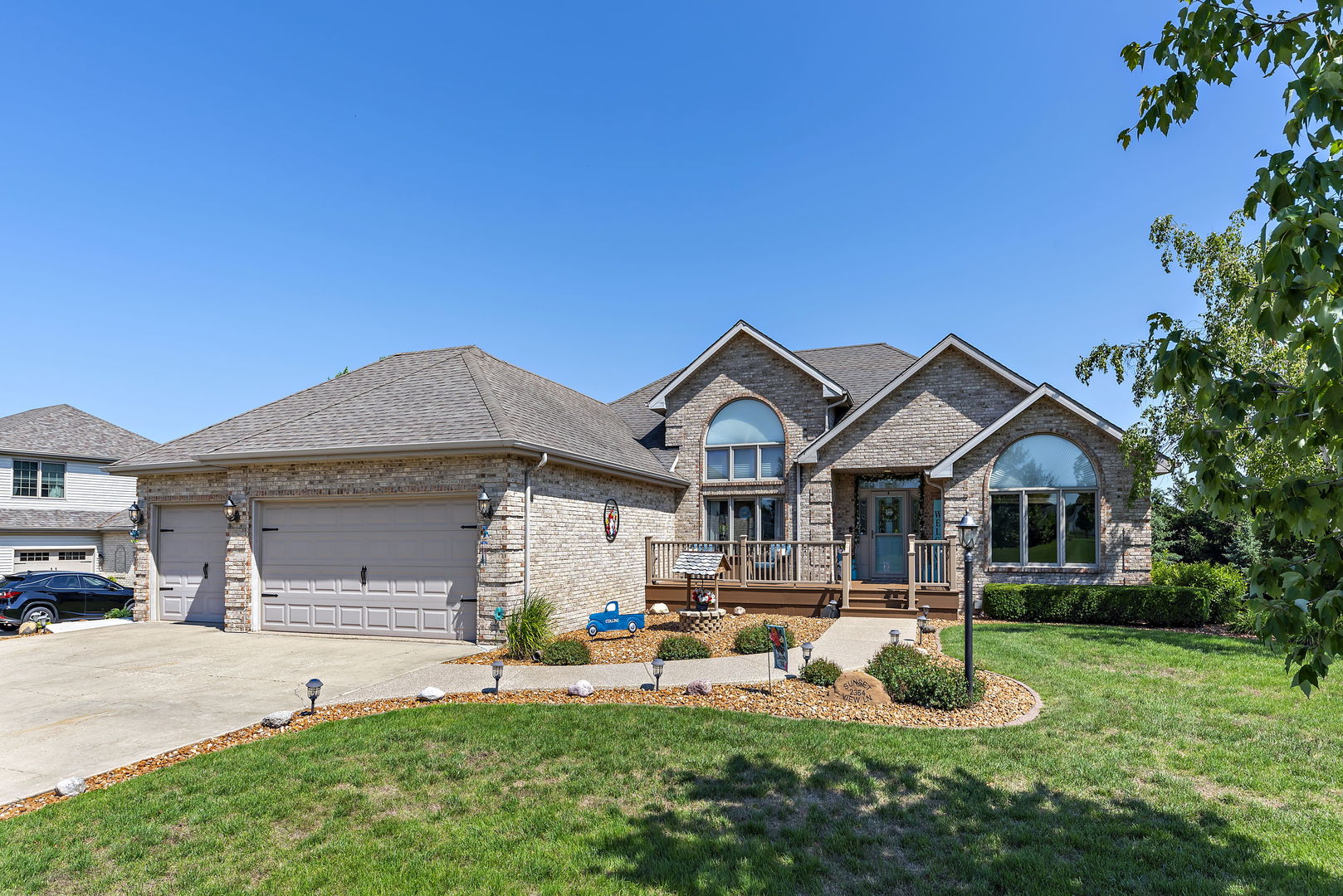 2364 Sunset View Lane Kankakee, IL 60901 - Photo 2 of 35 a front view of a house with garden