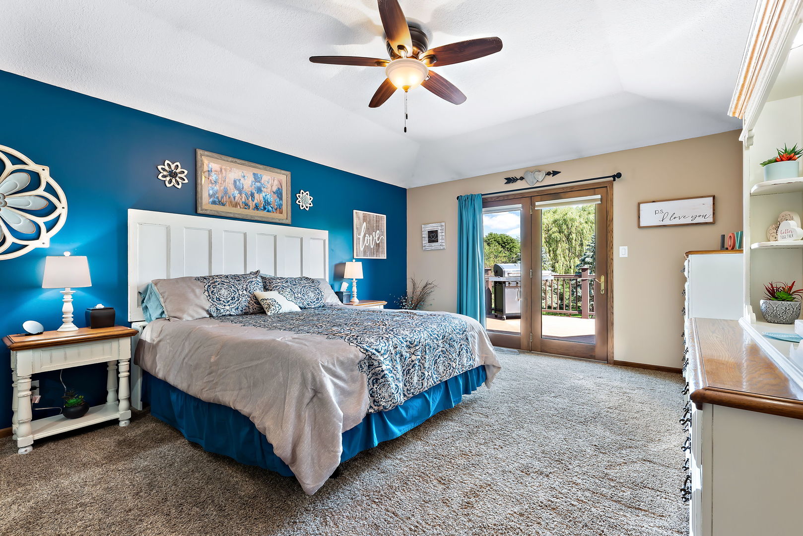 2364 Sunset View Lane Kankakee, IL 60901 - Photo 21 of 35 a bedroom with a bed painting on wall and a large window