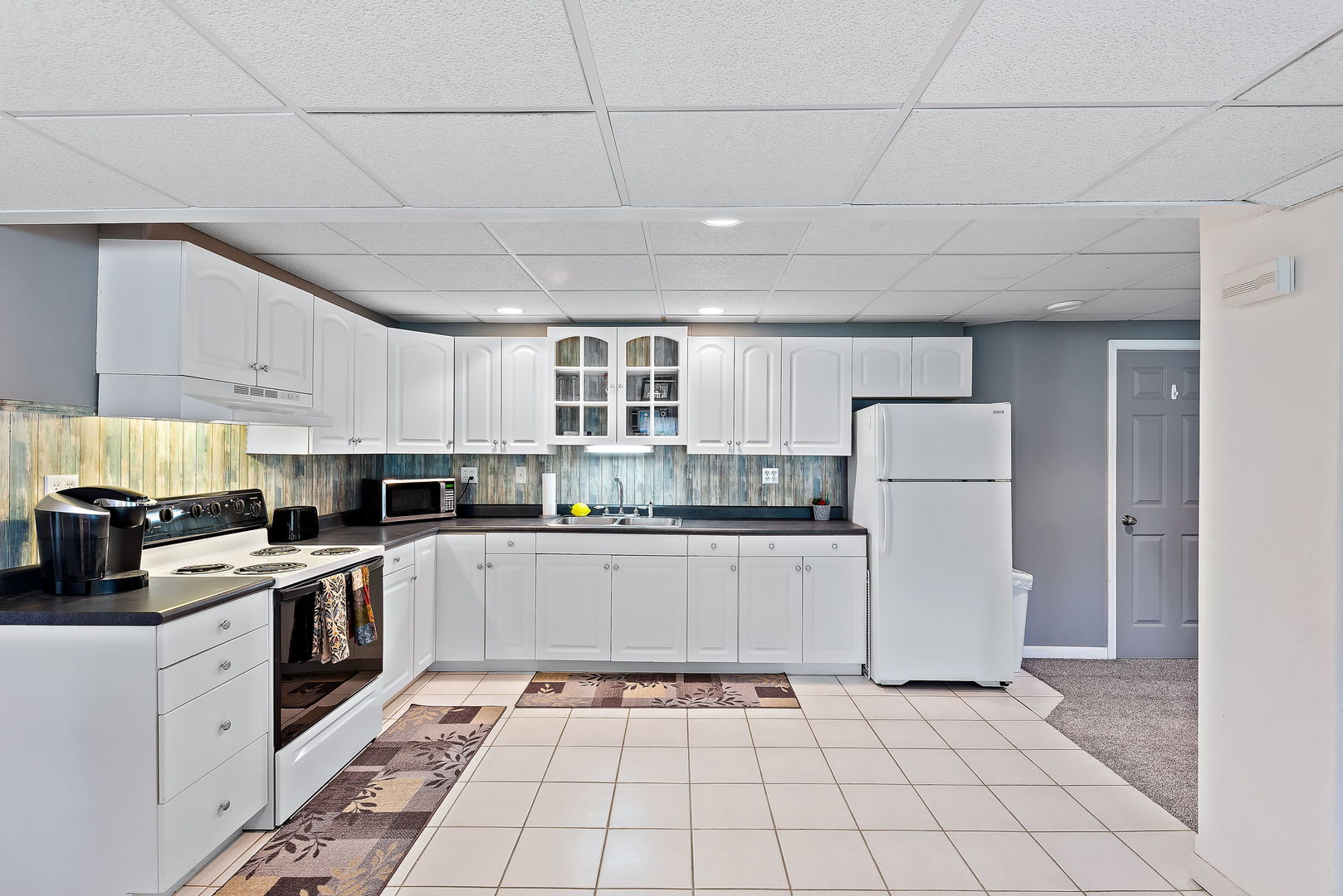 2364 Sunset View Lane Kankakee, IL 60901 - Photo 29 of 35 a kitchen with cabinets and steel stainless steel appliances