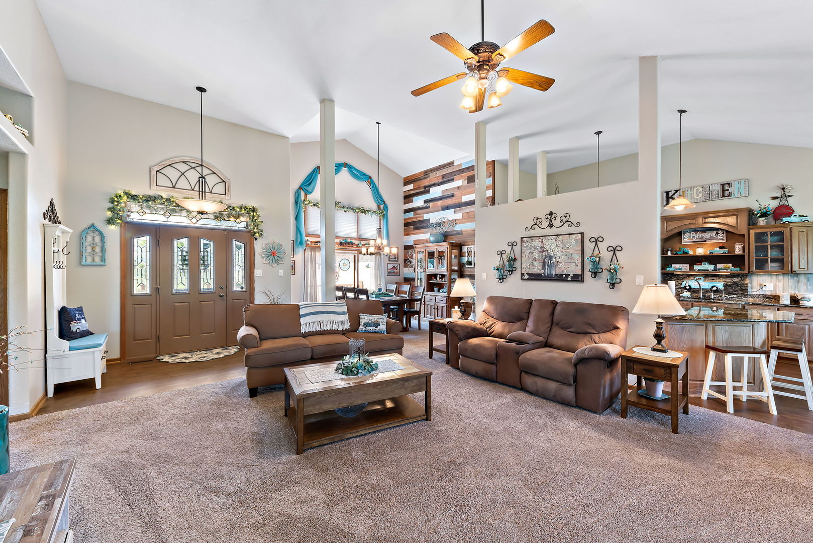 2364 Sunset View Lane Kankakee, IL 60901 - Photo 6 of 35 a living room with furniture a chandelier and a chandelier