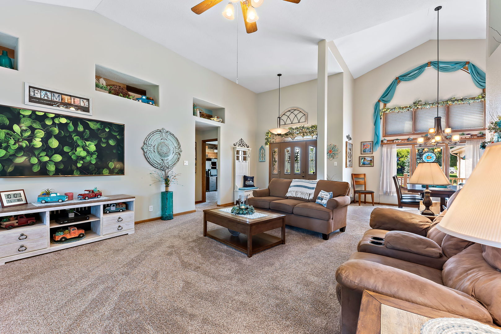 2364 Sunset View Lane Kankakee, IL 60901 - Photo 7 of 35 a living room with furniture and a chandelier
