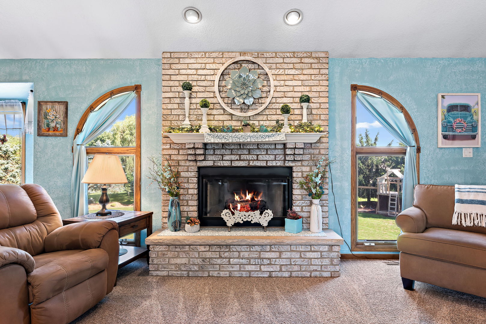 2364 Sunset View Lane Kankakee, IL 60901 - Photo 9 of 35 a living room with furniture a fireplace and a large window