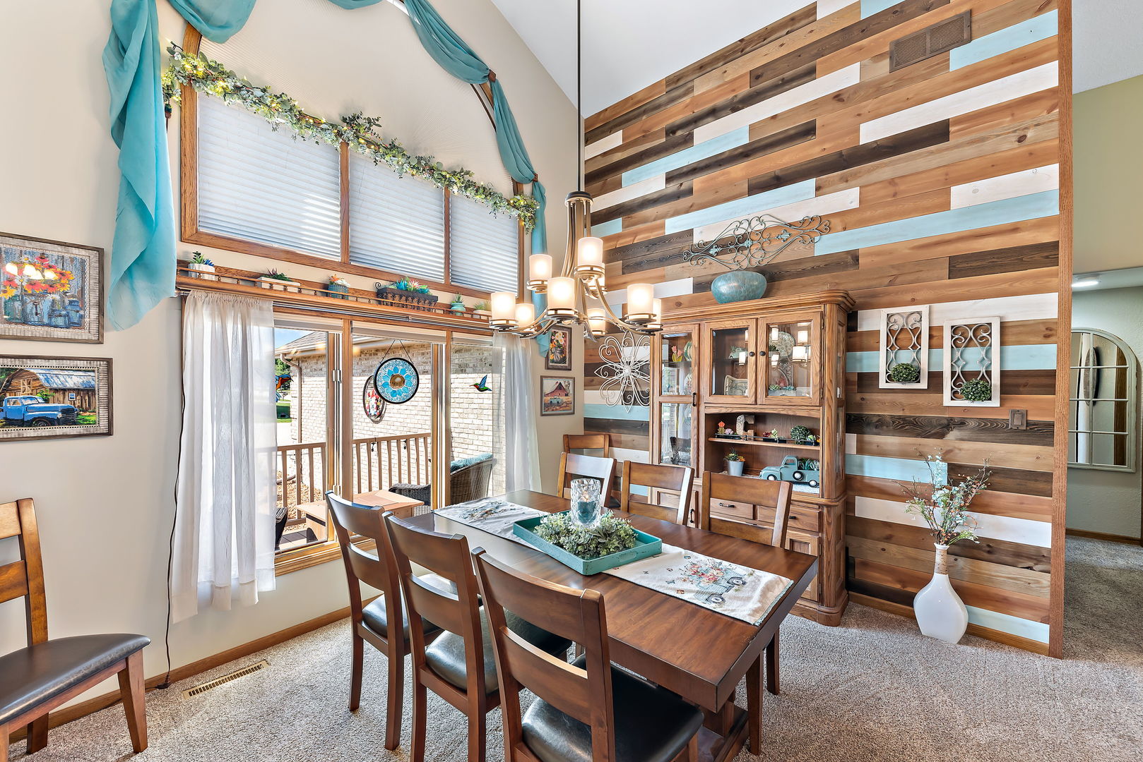 2364 Sunset View Lane Kankakee, IL 60901 - Photo 10 of 35 a dining room with a wooden table and chairs
