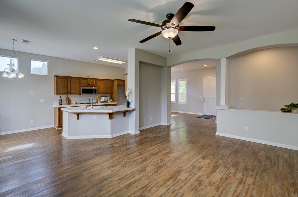 3235 Rall Avenue Clovis, CA 93619 - Photo 10 of 33 a view of kitchen with cabinets and wooden floor