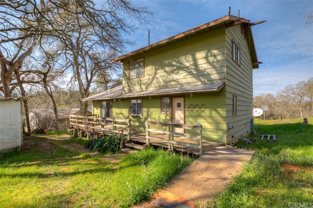 3030 Grubbs Road Oroville, CA 95966 - Photo 1 of 1 a view of a house with a yard balcony and sitting area