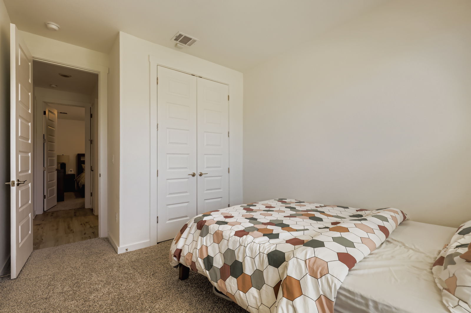 1909 Ruger Pass Leander, TX 78641 - Photo 16 of 31 Carpeted bedroom featuring a closet and baseboards