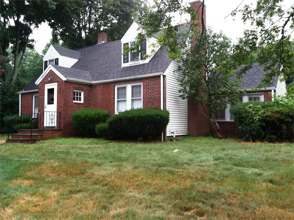 34 Wilkins Road Braintree, MA 02184 - Photo 1 of 12 a view of a house with a yard