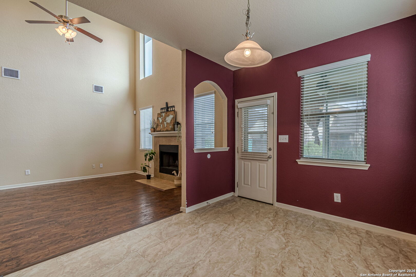 204 Wildcat Run Cibolo, TX 78108 - Photo 14 of 41 a view of an empty room with window and wooden floor