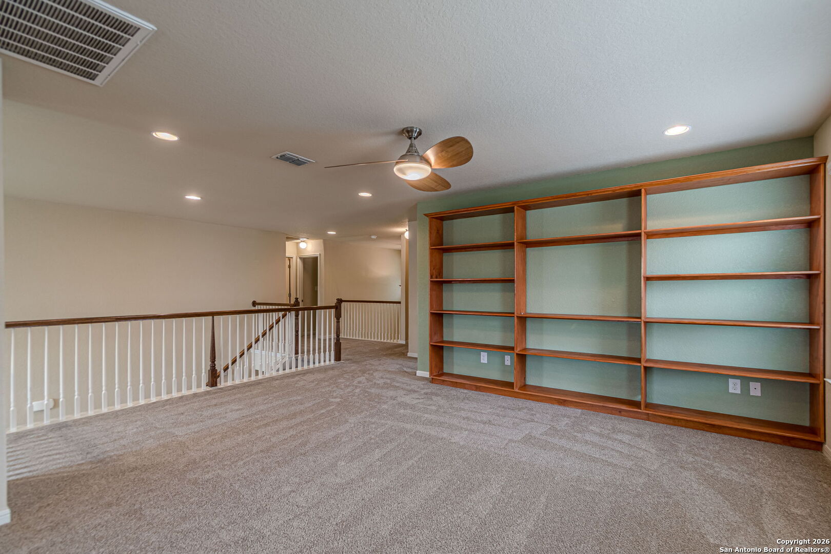 204 Wildcat Run Cibolo, TX 78108 - Photo 28 of 41 a view of empty room with empty shelves