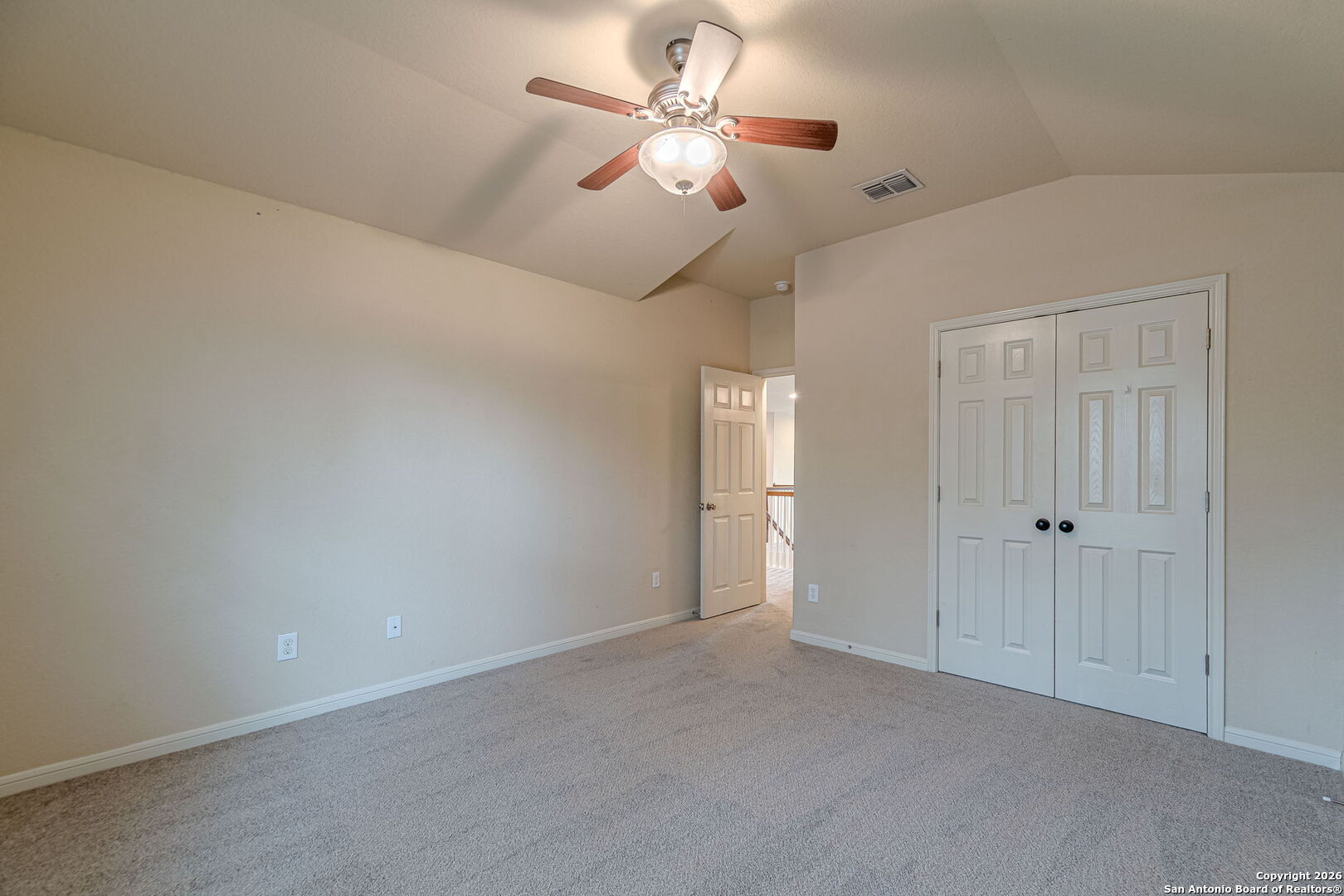 204 Wildcat Run Cibolo, TX 78108 - Photo 36 of 41 a view of a room with a ceiling fan and a chandelier fan