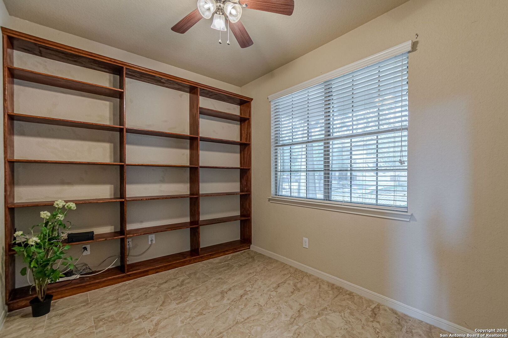 204 Wildcat Run Cibolo, TX 78108 - Photo 6 of 41 a view of an empty room with a window