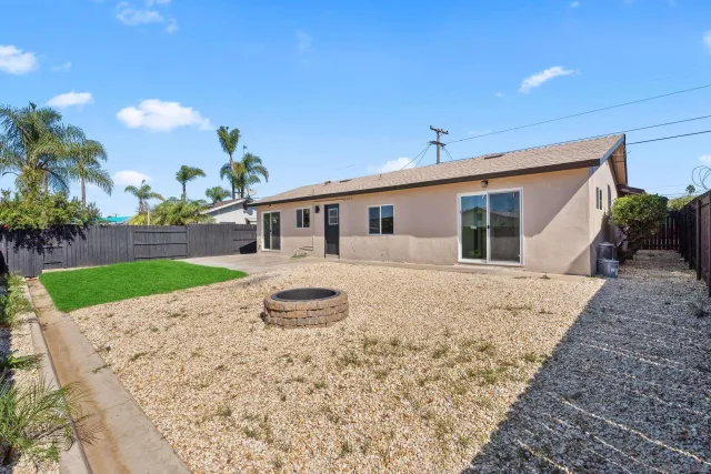 a front view of house with yard and seating