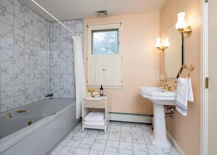 a bathroom with a sink and a bathtub
