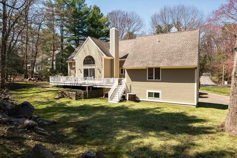 a view of a house with a swimming pool