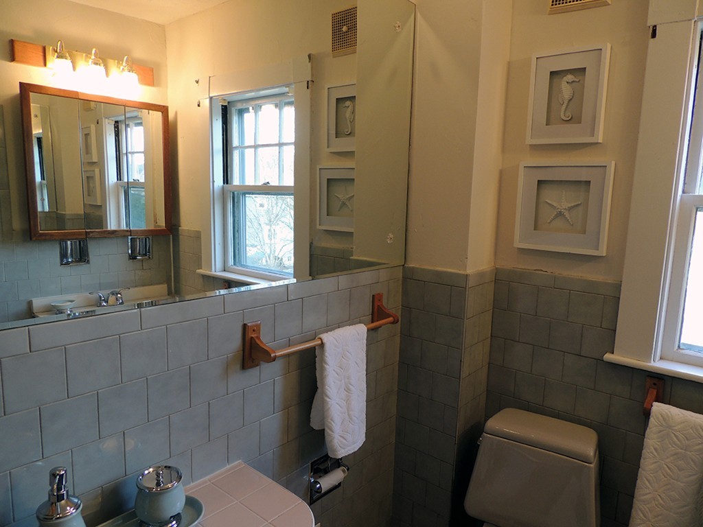 22 Symmes Road Winchester, MA 01890 - Photo 13 of 20 a bathroom with a toilet a sink and shower