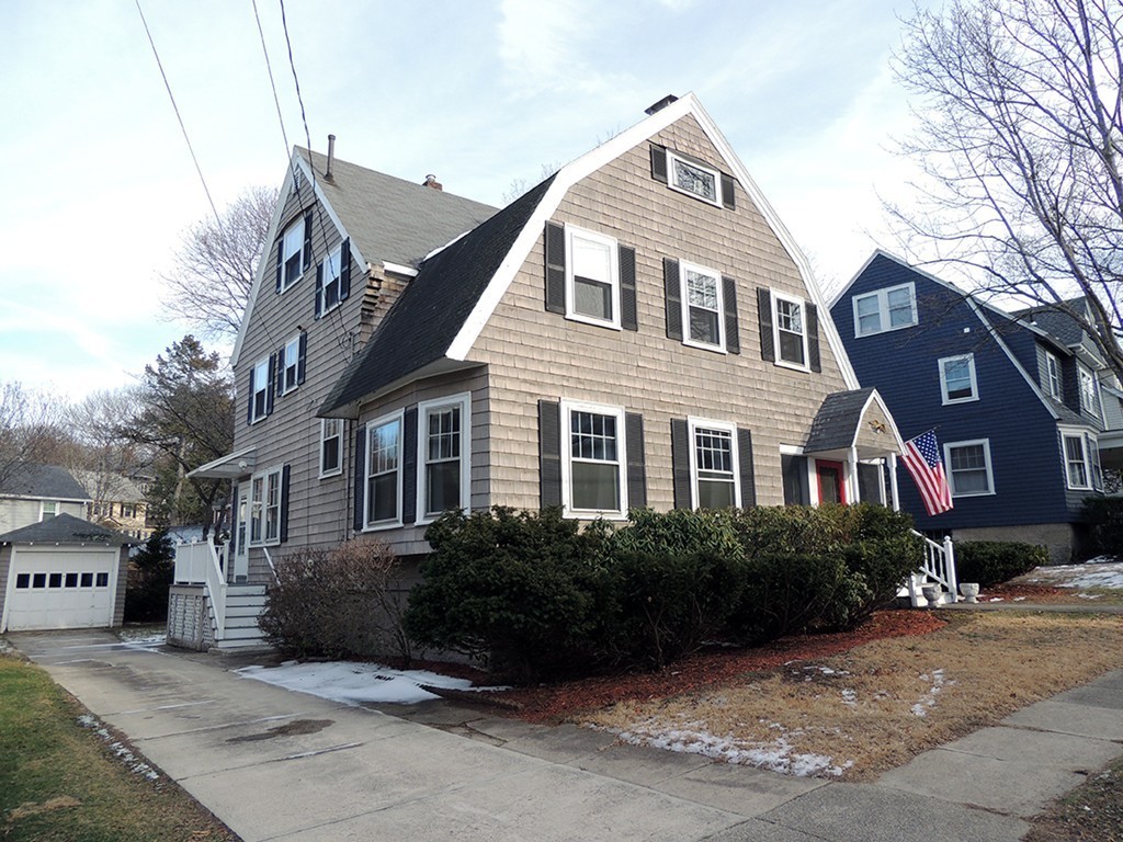 22 Symmes Road Winchester, MA 01890 - Photo 18 of 20 a front view of a house with a garden